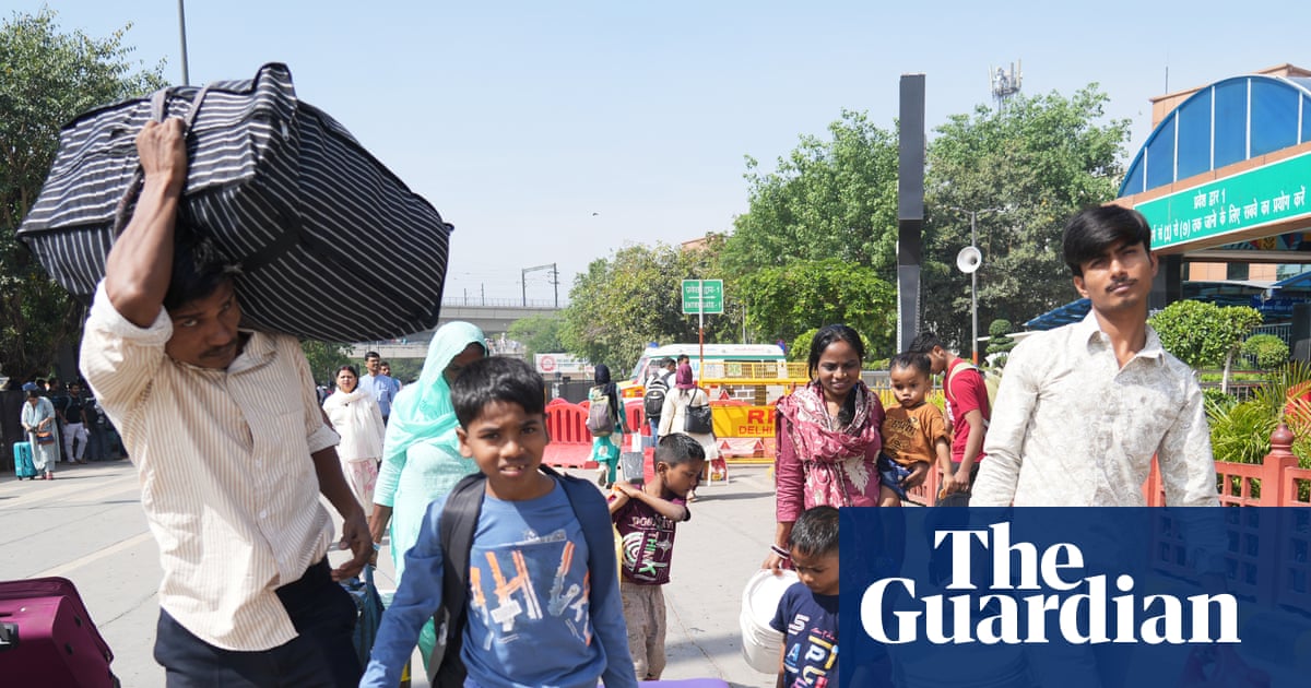 ‘I’ve not had proper food for days’: migrant workers leave India’s cities as Iran war fuel crisis deepens