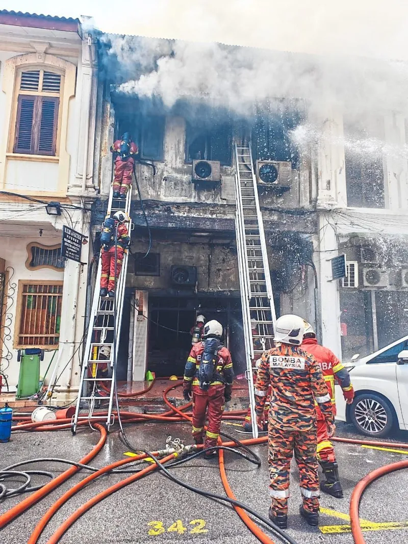 Veteran lawyer, clerk killed in George Town blaze