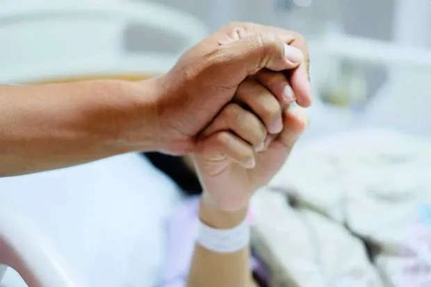 Doctor questions rejection of aid for former nurse's cancer treatment