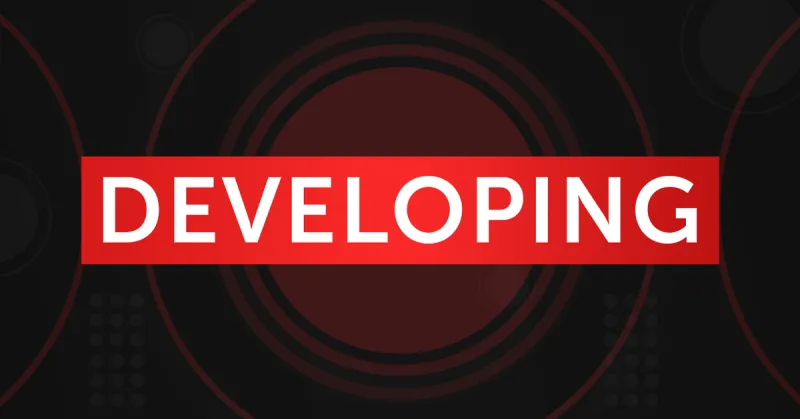 Man set alight at Wollongong unit complex as police hunt attacker